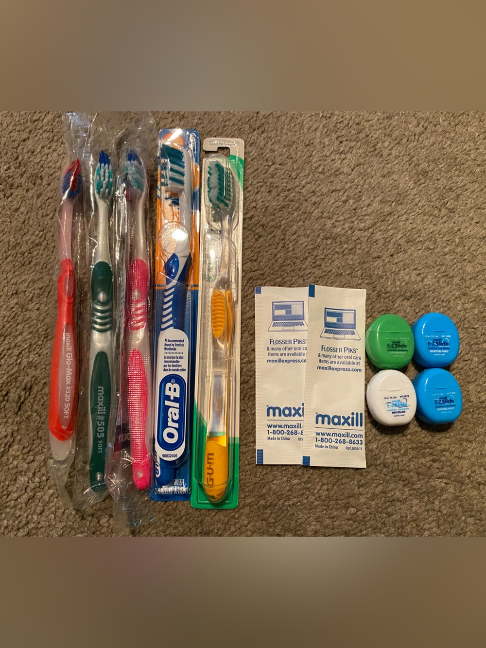 Dental floss and toothbrushes - new